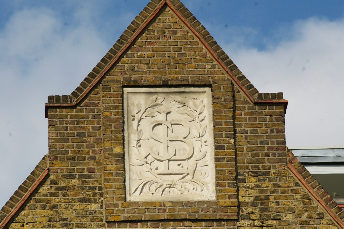 A plaque in stone with LSB wriiten on it