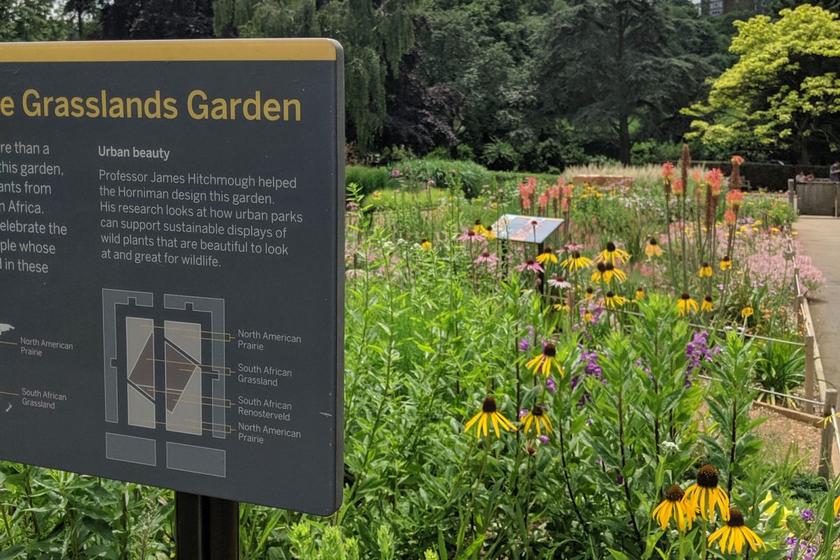 A board reading Grasslands Garden, in the Grasslands Garden