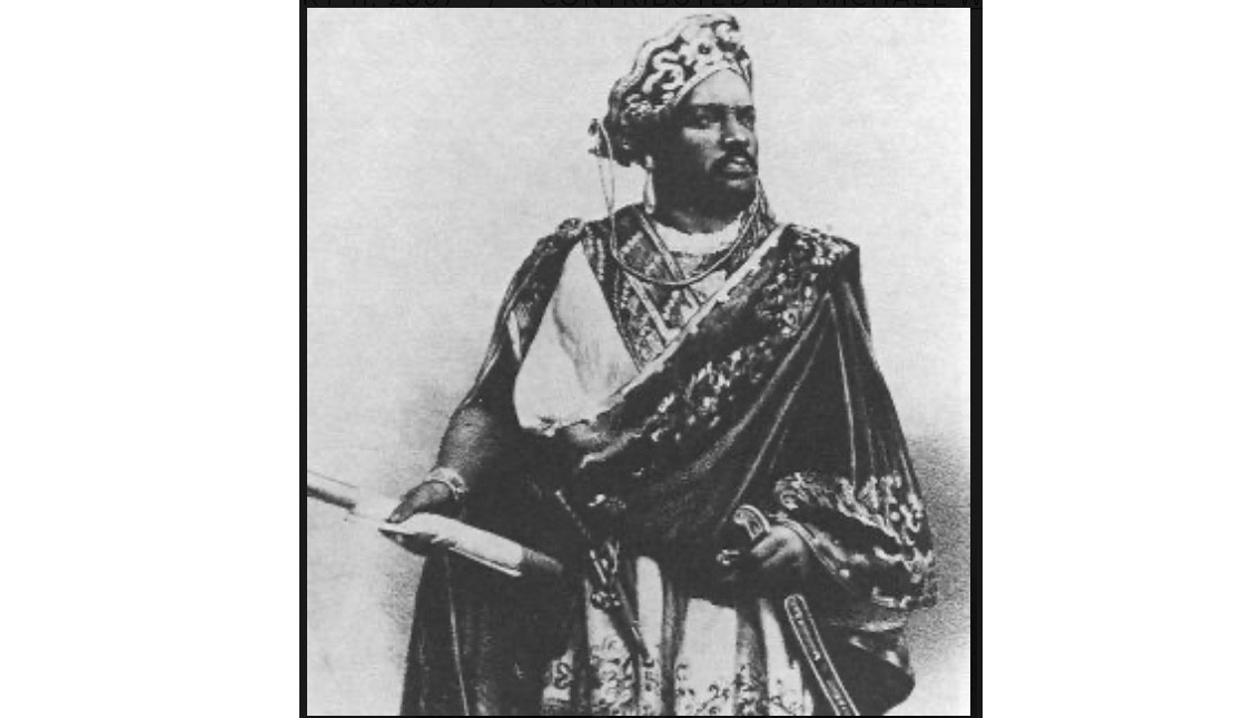 Black and white image of man in Shakespearian outfit