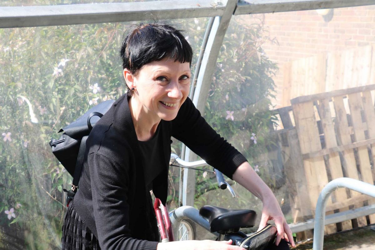 Cookie locks her bike up