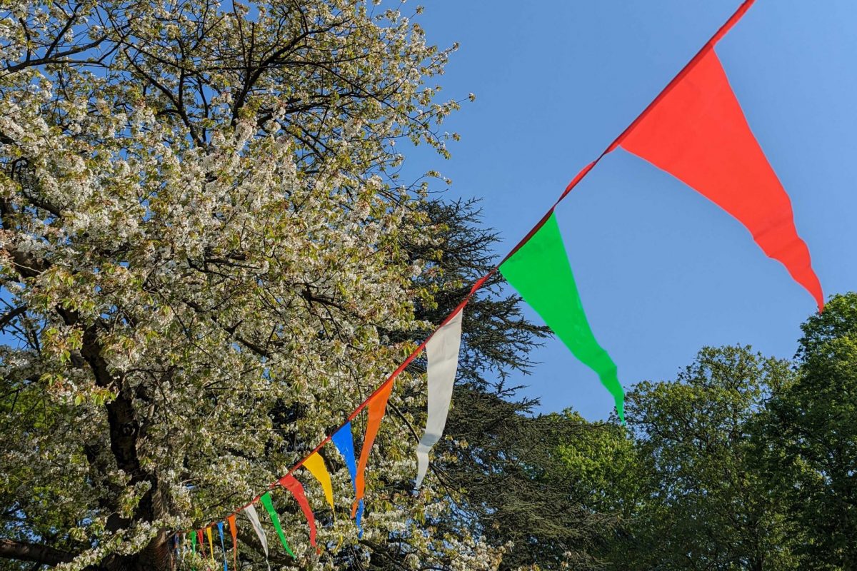 Colourful bunting with blue sky behind