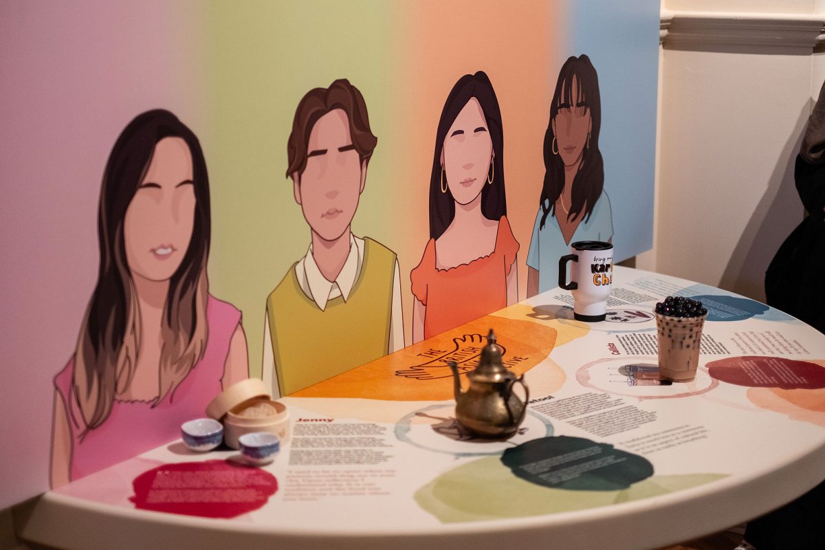 A table with stories from tea drinkers with models of the tea they drink