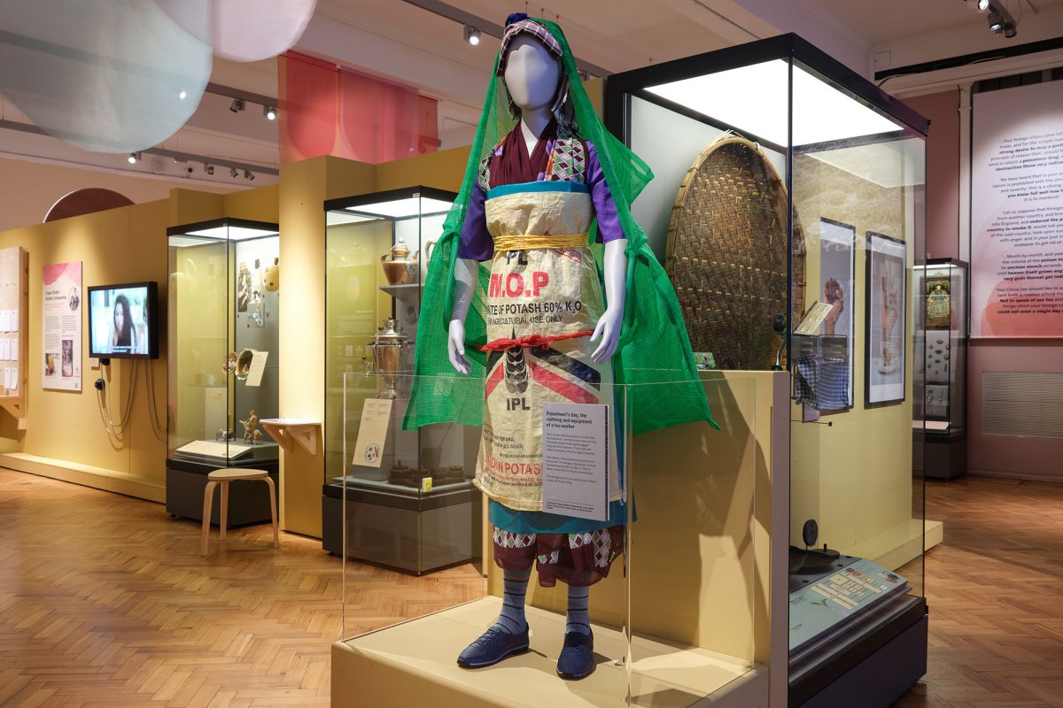 Model with an outfit of a tea plantation worker in the Cha, Chai, Tea, exhibition