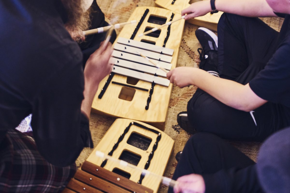 Children play instruments at an Enchanted Cinema screening